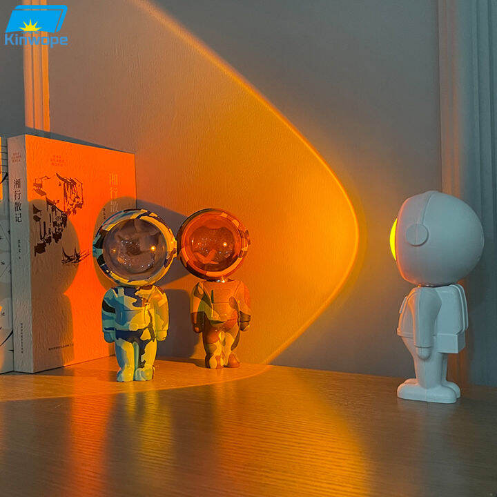 sunset-sunset-lights-astronaut-atmosphere-dusk-robot-astronaut-projection-lights-colorful-atmosphere-lights