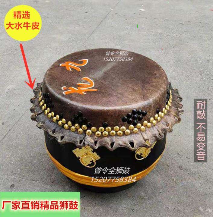 Selected smooth buffalo hide drums and hard wooden barrels, handmade
