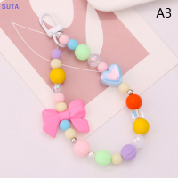 ?【Lowest price】SUTAI พวงกุญแจลูกปัดรูปโบว์ที่มีสีสันสดใสประดับด้วยลูกปัดรูปหัวใจสีสดใสอุปกรณ์เสริมเคสหูฟังกระเป๋าตกแต่งอย่างมีเสน่ห์