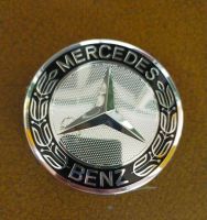 (ราคาต่อชุด 4 ฝา) พร้อมส่ง  ฝาครอบดุมล้อBenz เบนซ์ ขนาด 75 มม. ลายช่อมะกอกดำ ของใหม่ สำหรับBenz #W124 #W202 #W210 #W211