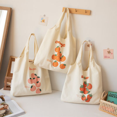 กระเป๋าสะพายขนาดเล็กหญิงเกาหลีใต้นักเรียน Ins กระเป๋าสะพายข้างน่ารักเสื้อกล้ามสตรอเบอร์รี่กระเป๋า Mass Art ผ้าใบกระเป๋า