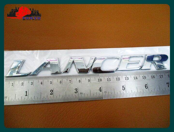 mitsubishi-logo-lancer-plate-sticker-chrome-size-18x2-cm-1-set-โลโก้-lancer-ติด-mitsubishi-ขนาด-18x2-ซม-พร้อมกาวติด