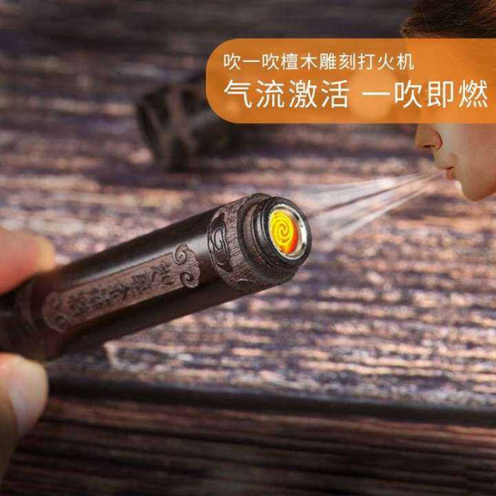 The ancient lighter of fire, the passbook of fire, the oldfashioned open flame blowing, strange