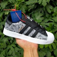 ﹍ New shell head spirit snake reflective leisure sports student couple all-match small sneakers