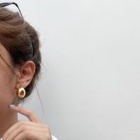 MNE -  Moon ball pin earring | ต่างหูงานไทเทเนี่ยม