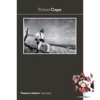 Happiness is the key to success. ! Robert Capa (Photofile) [Paperback]