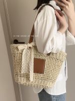 Uniqlo New Fashion version Large-capacity straw bag for women 2023 new summer style woven commuter beach vacation style one-shoulder armpit tote bag