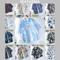 SEATUEMA เสื้อแขนสั้นฮาวายชายและหญิงสไตล์ฮ่องกงเก๋คู่หลวมชายหาดริมทะเลเสื้อสี