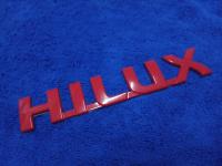 AD.โลโก้ HILUX (VIGO) สีแดง 3.4×18.5cm  1ชิ้น