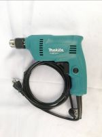 สว่านไฟฟ้า ​ขนาด​ 10mm.(3/8") รุ่น​ M0600B 220V​ 1.9A​  50-60Hz​ 400W ยี่ห้อ​ Makita คุณภาพ มาตรฐาน