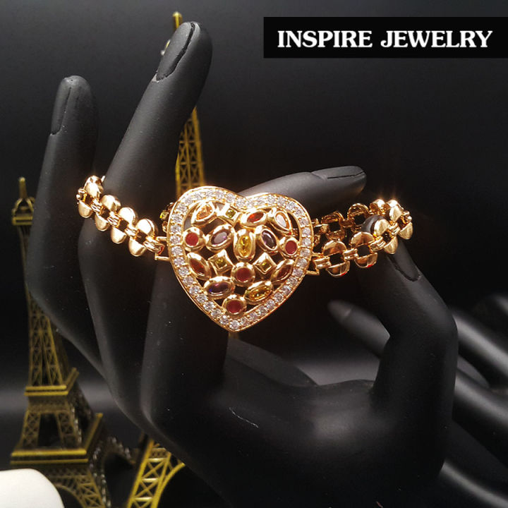 inspire-jewelry-สร้อยข้อมือกึ่งกำไล-ฝังพลอยนพเก้า-และล้อมด้วยฝังเพชรสวิส-สวยงามมาก-งานแฟชั่นชั้นนำ