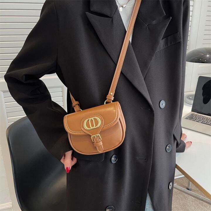 spring-popular-small-bag-female-ins-senior-feeling-inclined-shoulder-bag-2022-new-tide-western-style-restoring-ancient-ways-one-shoulder-saddle-bag