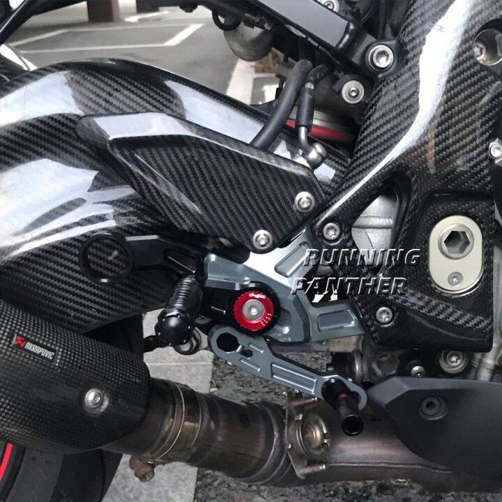 ที่วางเท้า-s1000r-s1000rr-คาร์บอนไฟเบอร์อุปกรณ์เสริมรถจักรยานยนต์แบบใหม่ฝาหลังปรับได้ปลอกคาร์บอนไฟเบอร์ที่วางเท้าด้านหลังที่วางเท้า1000-r-r-r