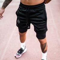 Muscles double shorts in the summer of male basketball fitness beach pants breathable loose running speed dry 5 minutes of pants