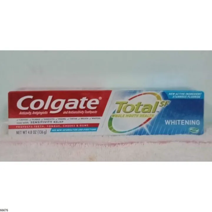 toothpaste dispenser with toothbrush holder Colgate Total Whole Mouth