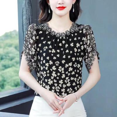 เสื้อผ้าแฟชั่นผู้หญิงฤดูร้อนแขนสั้นเสื้อพิมพ์ลายลายดอกไม้วินเทจเสื้อรอบคอหลวมเดินทางแบบเกาหลี