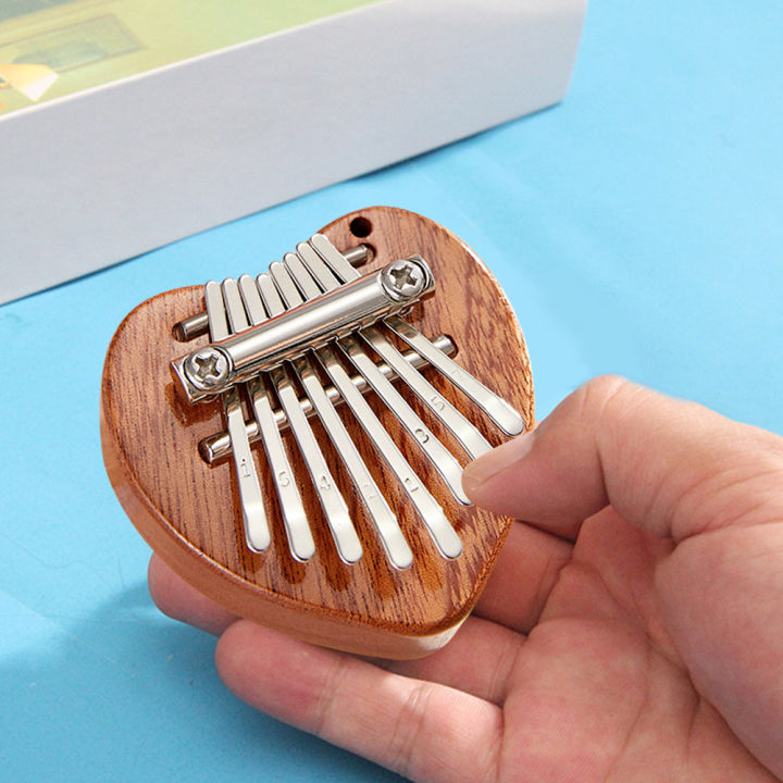 มินิแบบพกพา8คีย์แผ่นเปียโน-kalimba-thumb-นิ้วเครื่องมือฝึกเปียโนนิ้วมือสำหรับผู้เริ่มต้นของขวัญคริสต์มาส
