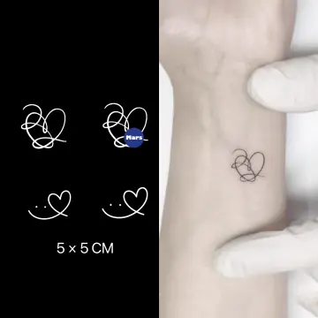 BTS heart and airplane tattoo located on the neck.