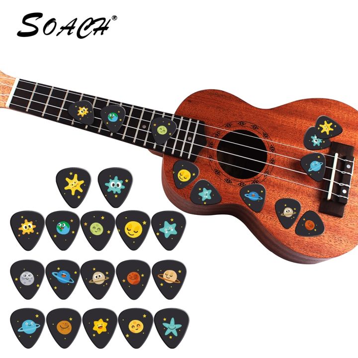 cw-soach-10pcs-lot-0-71mm-thickness-cartoon-vastness-of-the-universe-star-guitar-picks-strap-parts-acc