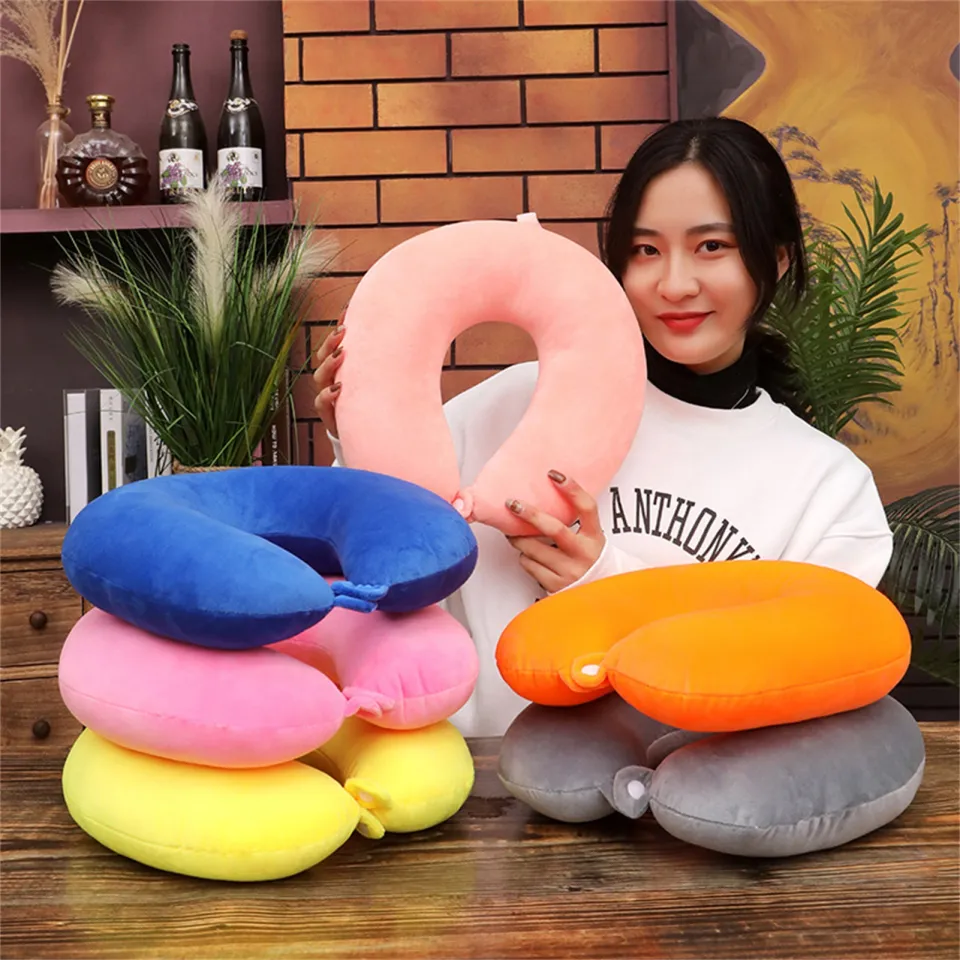 Down filled travel outlet pillow