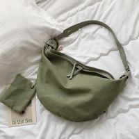 Bag womens large capacity new explosive style foreign style canvas shoulder bag fashion casual Messenger chest bag dumpling bag 【QYUE】