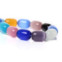 Loose beads ลูกปัดแก้ว cats eye เกรดBทรงรี ขนาด13x10mm 1 เส้นยาว 35.5ซม. ประมาณ 27 เม็ดคละสี