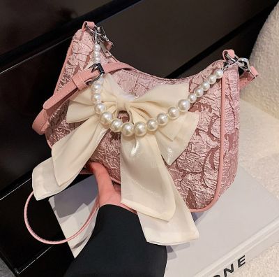 Female 2022 summer this year popular niche design bag new joker oblique satchel bowknot is one shoulder alar package