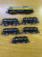 N Scale Atlas Diesel Locomotive, Minneapolis &amp; St Louis, and new Tomix Oil Tankers set of 5.  Fully tested (GL07) เป็นหัวรถจักรดีเซล N Scale Atlas ใหม่ มินนิอาโปลิส &amp; เซนต์หลุยส์ และชุดเรือบรรทุ