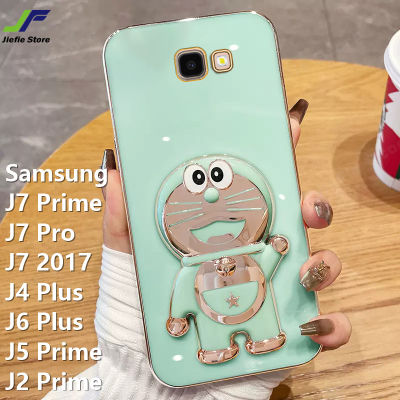 เคสโทรศัพท์โดราเอม่อน JieFie สำหรับ Samsung Galaxy J7 Prime/J4พลัส/J6พลัส/J7 2017/J7โปร/J5ไพรม์/ไพร์ม J2ตุ๊กตาน่ารักตัวยึดฝาครอบโทรศัพท์เนื้อนิ่ม TPU ชุบโครเมี่ยม + ขาตั้ง