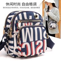 △❈ shi nylon fabric inclined shoulder bag 2022 new female fashion one portable coin purse printing