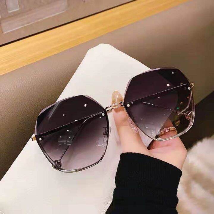 Designer hot sale hexagon sunglasses