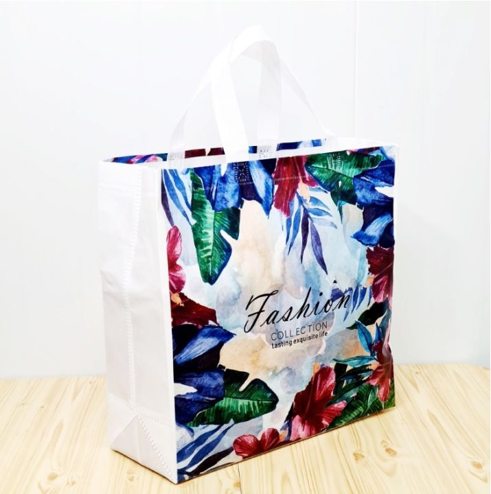 at-outletถุง-กระเป๋าผ้า-สปันบอนด์-ลายดอกไม้-กันน้ำได้-กระเป๋าใบใหญ่-กระเป๋าใส่ของ-ถุงผ้าสปันบอนด์เคลือบกันน้ำ