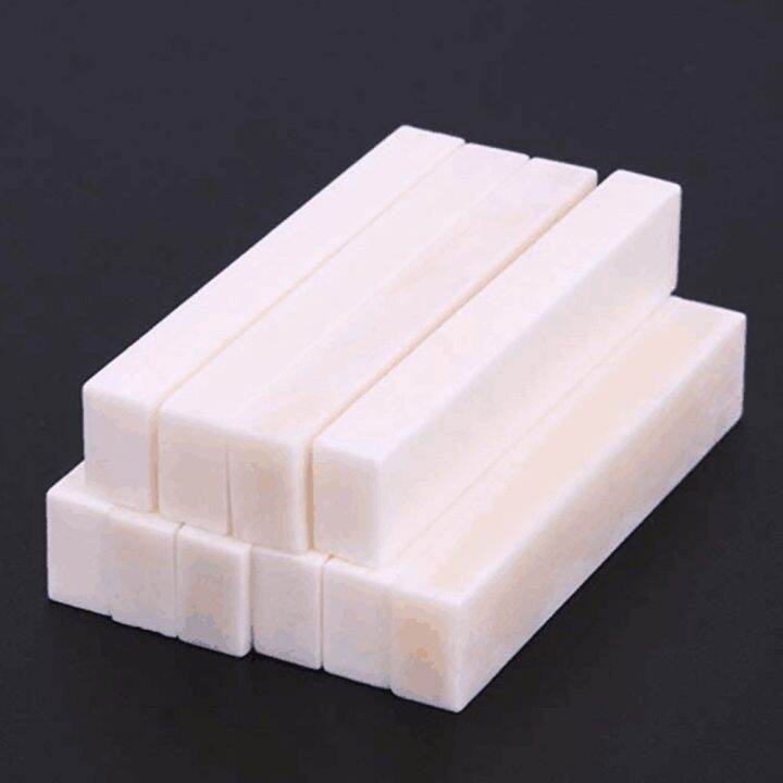 thumbnail image 2 of 10-Pack Of BLANK Bone Guitar/Ukulele Nuts - Uncut For Luthiers & DIY Repair (55x6x10mm) 2 of 14