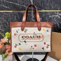 พร้อมส่ง กระเป๋า OUTLET แท้ ?%  2773 FILD TOTE 30 WITH GARDEN EMBROIDERY โค้ช BADGE