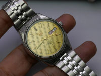 นาฬิกา Vintage มือสองญี่ปุ่น Seiko 5 Five ระบบ Automatic Day Date 6309 602A ผู้ชาย ทรงกลม กรอบเงิน หน้าลายทอง หน้าปัด 37มม. สายสแตนเลสใช้งานได้ปกติ สภาพดี ของแท้ ไม่กันน้ำ