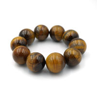 ไทเกอร์อาย พลอยตาเสือ พลังแห่งดวงตาที่สาม สร้อยข้อมือหินแท้ ขนาด 20 มม. tigers eye by siamonlineshop