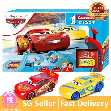 carrera first disney/pixar cars 3 slot car race track includes 2 cars:  lightning mcqueen and dinoco cruz batterypowered beginner racing set for  kids ages 3 years and up 