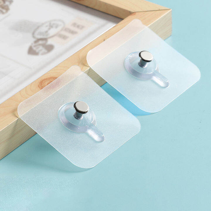 Invisible And Versatile Adhesive Hooks For Hanging Pictures And