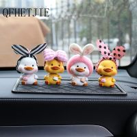 QFHETJIE Car Ornaments Cute Resin Bow Headband Duck Shaking His Head Doll Car Decoration Cartoon Auto Interior Accesories