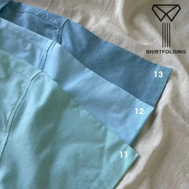 shirtfolding-เสื้อเชิ้ต-แขนสั้นคอปก-สีเขียวยีนส์-กระดุมดำ