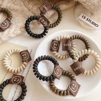 [Fast delivery] Telephone ring scrunchie matte female hair rope smiling face electric coil hair rope rubber band simple temperament ponytail