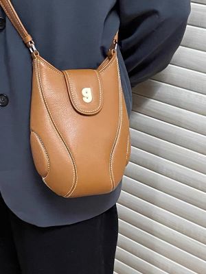 ของแท้ 100% KUNOGIGI baseball Phone bag Niche design bag Womens crossbody bag Womens single shoulder brand sling bag