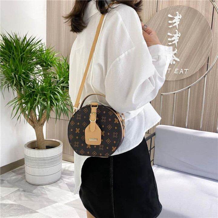 Lv round sling bag