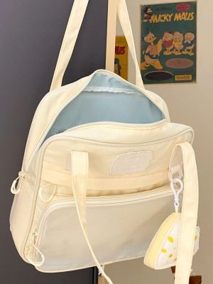กระเป๋าทรงสี่เหลี่ยมมีหูหิ้วสะพายไหล่ผ้าใบนักเรียนความจุขนาดใหญ่ผู้หญิงกระเป๋าสะพายไหล่กระเป๋าถือ