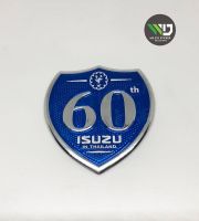 สติกเกอร์โลโก้ 60 ปี สำหรับ ISUZU (รถกระบะ) **ด้านหลังมีกาว 2 หน้าพร้อมติด**  **หากมีข้อสงสัยทักแชทก่อนสั่งซื้อสินค้า**