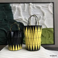 【ISSEY Miyake】❒✔ Miyake new western style small geometric ling spell color bucket bag fashion simple bump color female handbag