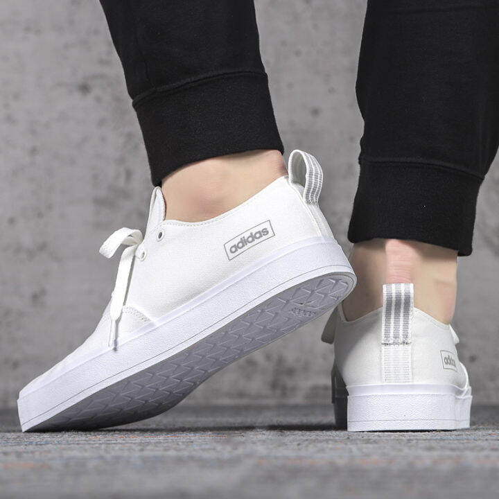 Buy Adidas Men's White Canvas Sneakers (202705983)- 11 UK at Amazon.in