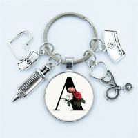 hot【DT】✎ﺴ♘  26 Letters New Design Glass Keychain Doctor Stethoscope Syringe Face Keyring