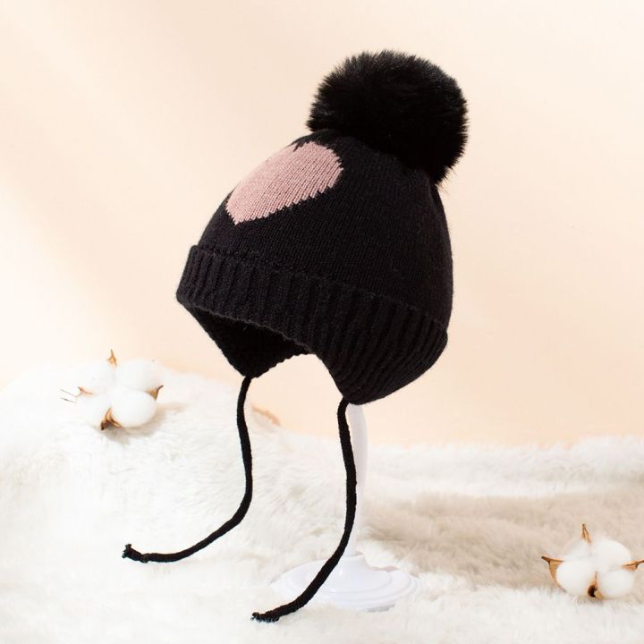 xinyang941727หมวกฤดูหนาวหมวกไหมพรมเด็กการเรียงขนแกะถักพร้อมที่ปิดหูหมวกขนสัตว์ปอม1-4ปี