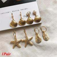 Large pearl earrings